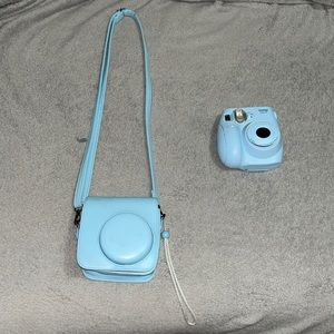 BLUE POLAROID CAMERA